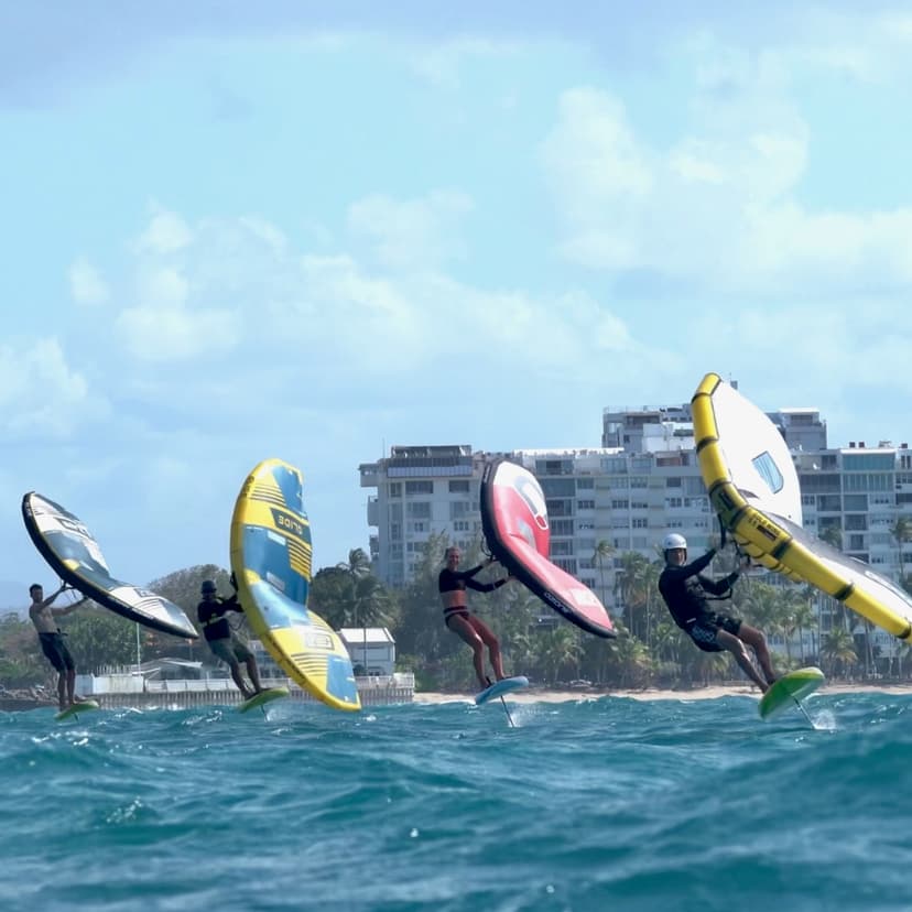 Group launching with colorful wings on beach